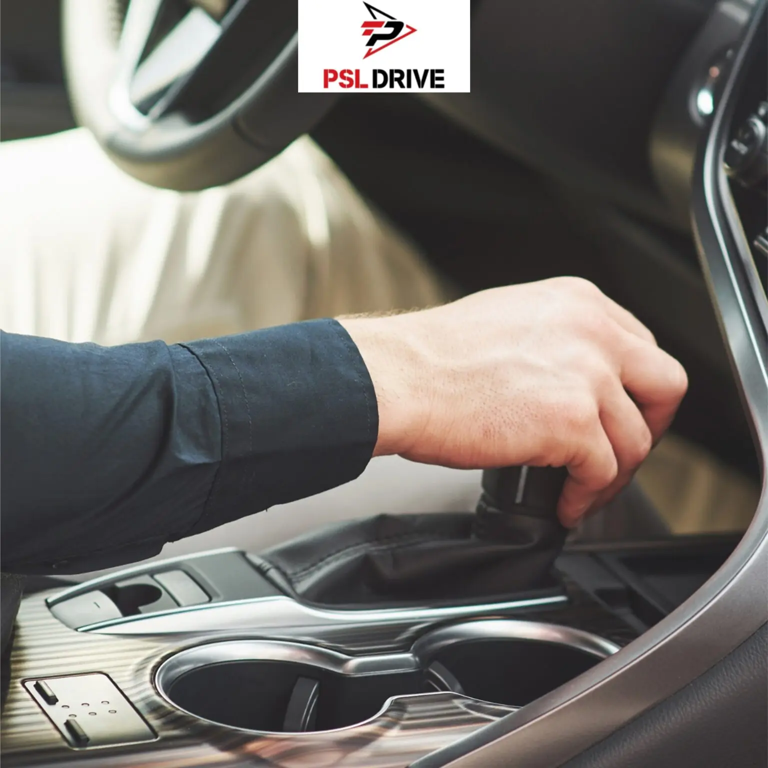 Driver's hand shifting the manual gear lever inside a car during a driving lesson at PSL Drive driving school